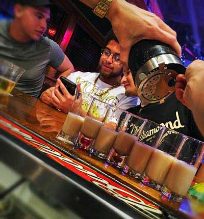 Happy Hour menu with friends sharing drinks