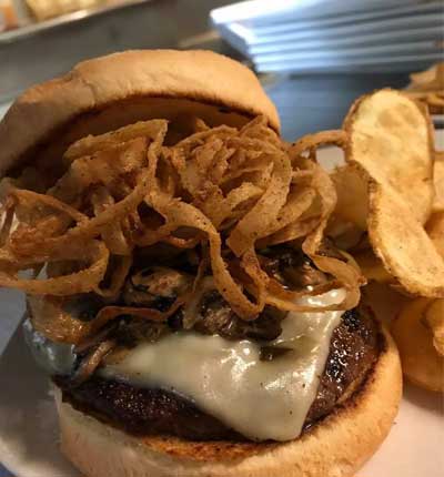 Lunch menu delicious burger with french fried onions